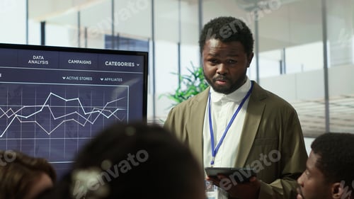 Preview: Coworkers engaging in a problem solving meeting at a corporation