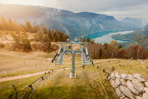 Preview: Town of Molveno with its lake as seen from the Pradel Plateau with its cable car in the foreground