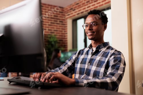 Preview: Software developer working on software program