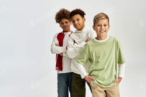 Preview: Vibrant friendship among stylish little boys showcasing their unique fashion sense