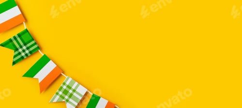 Preview: Saint Patrick day concept flat lay with garland flag, and on yellow background