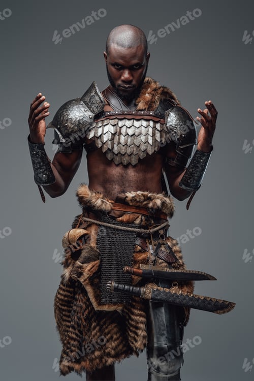 Preview: Authentic african barbarian prays with raised hands in gray background