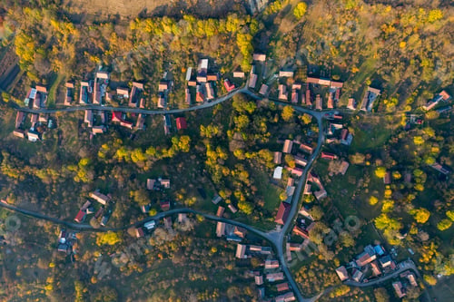 Preview: Aerial drone point of view of village streets in the autumn