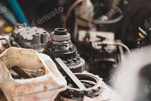 Preview: Closeup of an oily scrap machine used in a factory