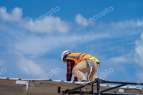 Preview: Roofing,Construction workers wearing safety harness checking and installation assembly of new roof.