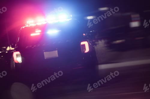 Preview: Police Cruiser with Flashing Lights in Night Time Action