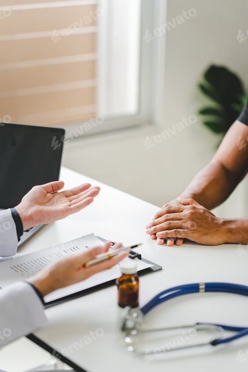 Preview: Doctor talking to patient and filling patient history, examination, treatment, medical and health co