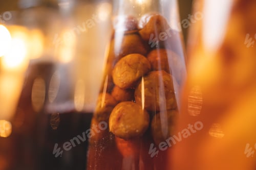 Preview: homemade craft soft drink, cold fresh beverage cocktail with honey and soda in glass cafe background