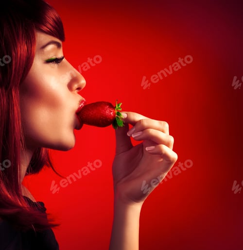 Preview: Seductive woman with strawberry