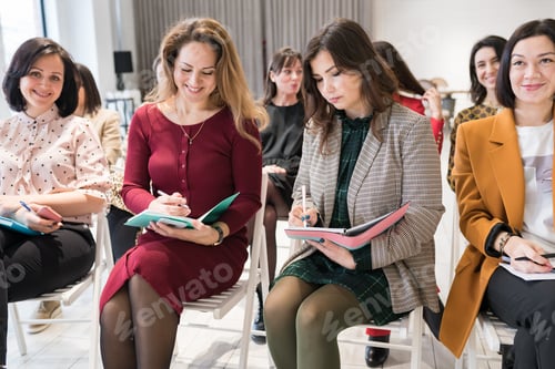 Preview: Women attending personal development seminar or conference. Life long learning