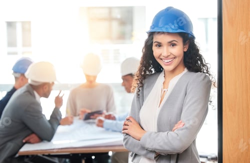 Preview: Shot of a young businesswoman standing with her arms crossed in an office at work