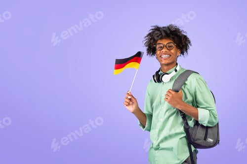 Preview: Modern education and knowledge exchange. African american teen guy with backpack and small Germany