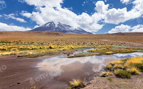 Preview: Majestic view of Volcano and clouds reflecting in water in Bolivia, South America