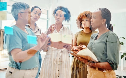 Preview: Creative women, fashion designers and meeting in planning, schedule or team brainstorming at office
