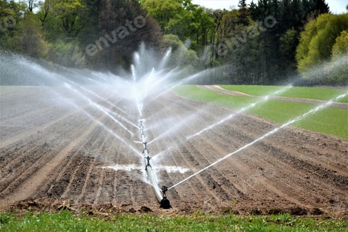 Preview: irrigation system watering crops farm land agriculture