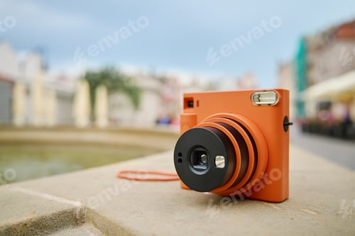 Preview: Vintage Orange Instant Camera. Travel shooting equipment
