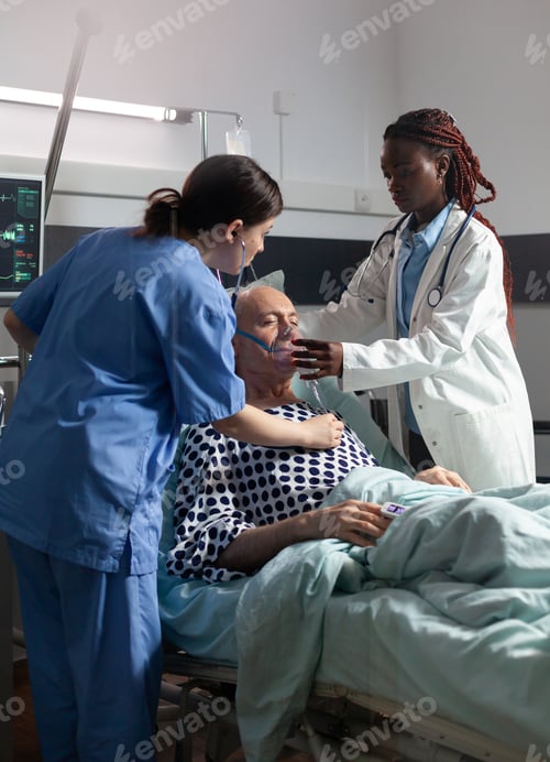 Preview: African doctor helping senior patient breath using repiratory ventilation tube