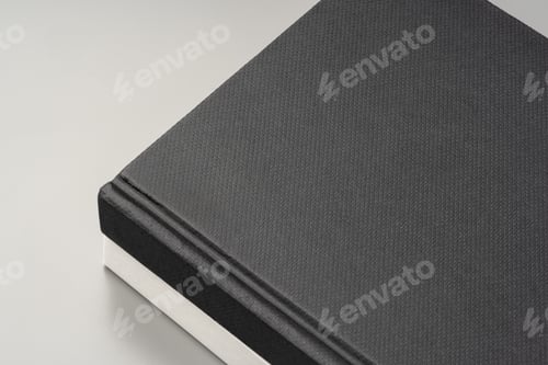 Preview: Blank notepad on gray background studio shot