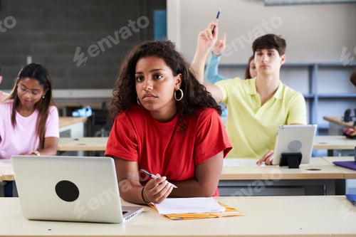 Preview: In the Classroom Multi Ethnic Students Listening to a Lecturer. Smart Young People Study at College.