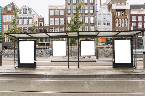 Preview: Stop in Amsterdam in Holland with blank advertising banners. Mockup concept