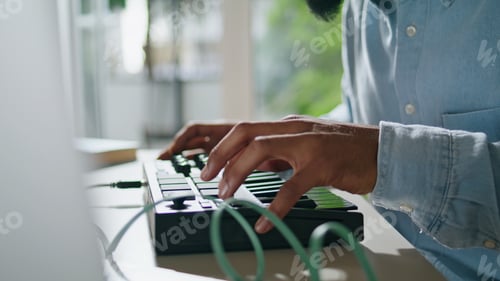 Preview: Producer hands typing console closeup. Unrecognizable engineer mixing music