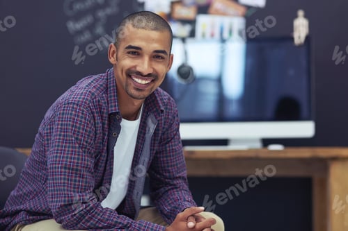 Preview: Feeling positive in the office. Cropped portrait of a young designer in the office.