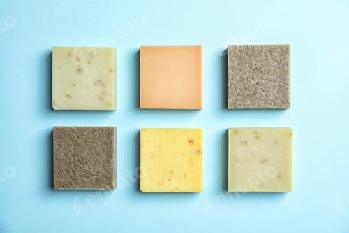 Preview: Hand made soap bars on color background, top view
