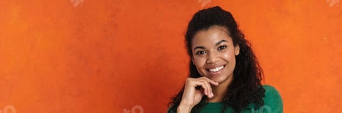 Preview: Happy smiling african casual brunette woman