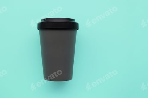 Preview: Reusable stylish eco friendly grey bamboo cup on mint background.