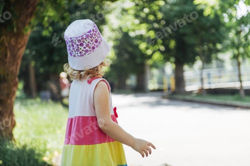 Preview: Beautiful girl in a summer sunny day