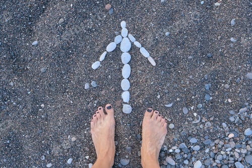 Preview: Arrow forward concept, in front of a woman's legs