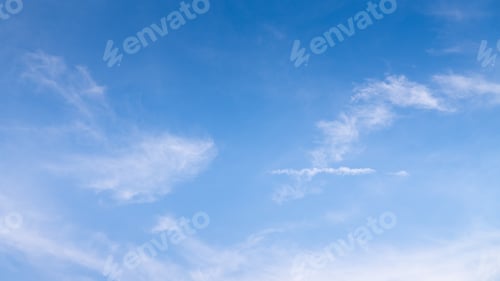 Preview: The sky is a vibrant blue with no clouds, and the bright sun makes it glow even more.