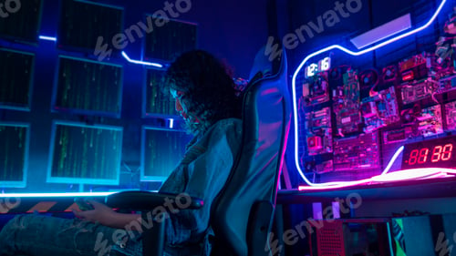 Preview: Woman programmer is working in her computer room