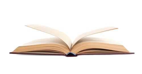 Preview: Old open hardcover book isolated on white