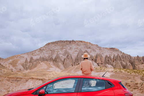 Preview: Happy woman on summer vacation in famous place. Cave formations