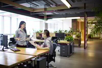 Preview: IT workers talking in office