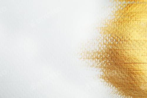 Preview: Golden paint on white background. Space for text