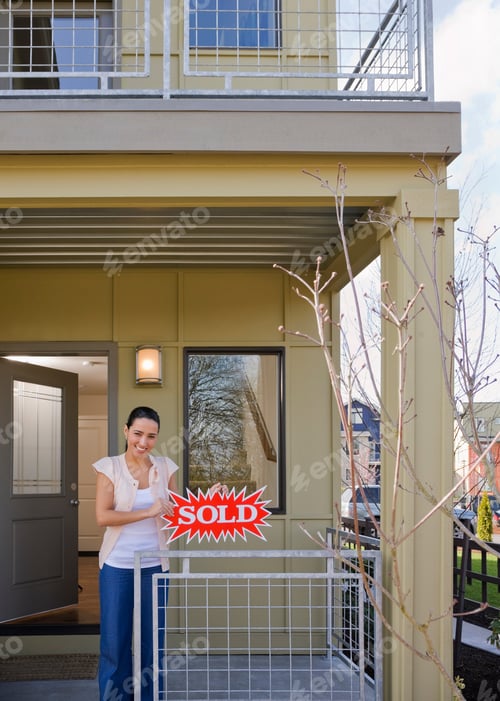 Preview: woman on front porch with sold sign