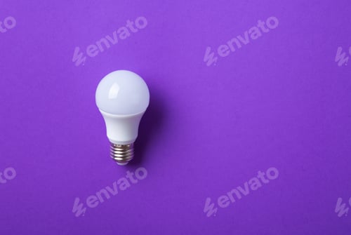 Preview: White lightbulb on purple background.
