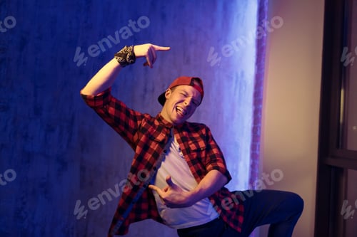 Preview: crazy hooligan in fashion clothes. bully is posing to the camera