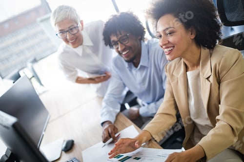Preview: Business people working and brainstorming in office