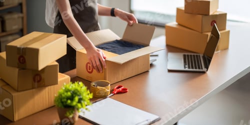 Preview: Close up young woman seller prepare parcel box of product for deliver to customer. Online selling