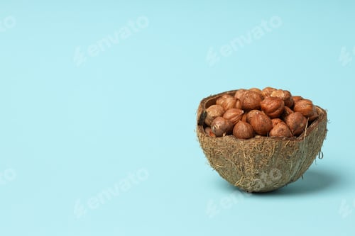 Preview: Healthy food and healthy nutrition concept, nuts - hazelnut