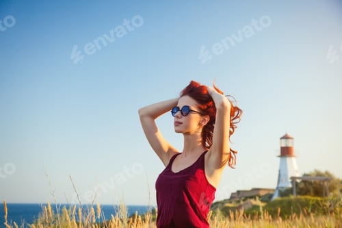 Preview: girl with sunglasses near Lighthouse