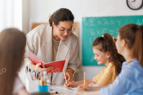 Preview: Happy kids and teacher at school