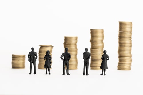 Preview: Group of figurines looking at growing stacks of coins