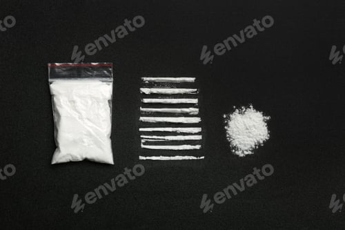 Preview: Flat lay composition with cocaine powder on black background