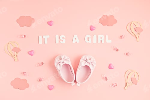Preview: Cute newborn baby girl shoes with festive decoration over pink background. Baby shower, birthday