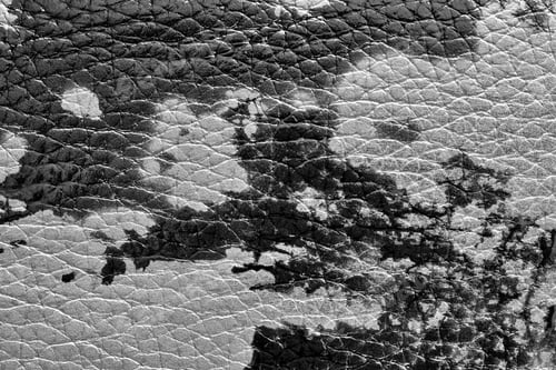 Preview: Abstract Background Of Rough Spotty Texture Of Natural Leather Closeup Monochrome Tone