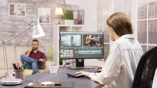 Preview: Side view of video editor working on a project